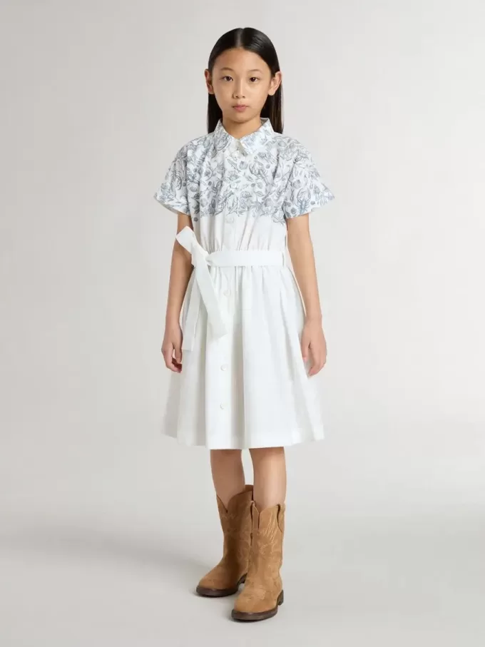 Abito chemisier da bambina in tela di cotone bianca con stampa nautica blu e bordino bianco