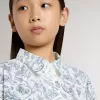 Abito chemisier da bambina in tela di cotone bianca con stampa nautica blu e bordino bianco