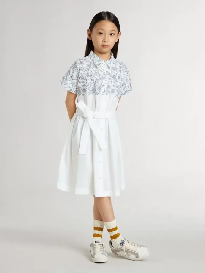 Abito chemisier da bambina in tela di cotone bianca con stampa nautica blu e bordino bianco