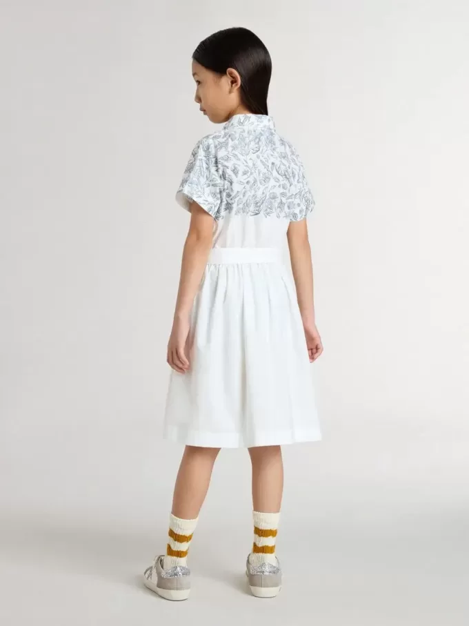 Abito chemisier da bambina in tela di cotone bianca con stampa nautica blu e bordino bianco