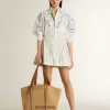 Abito corto da donna in cotone a righe bianche con stampa blu marino