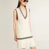 Abito da donna in cotone bianco consumato con bordi blu scuro e cristalli