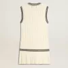 Abito da donna in cotone bianco consumato con bordi blu scuro e cristalli