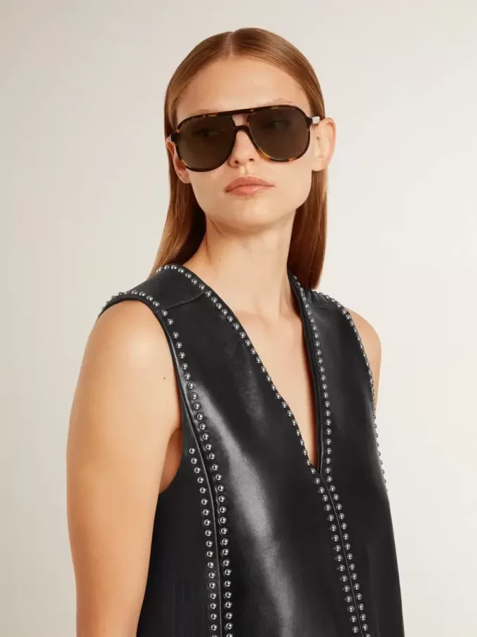 Abito da donna in nappa nera con borchie