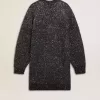 Abito nero da donna con scollo rotondo e paillettes argentate su tutta la superficie