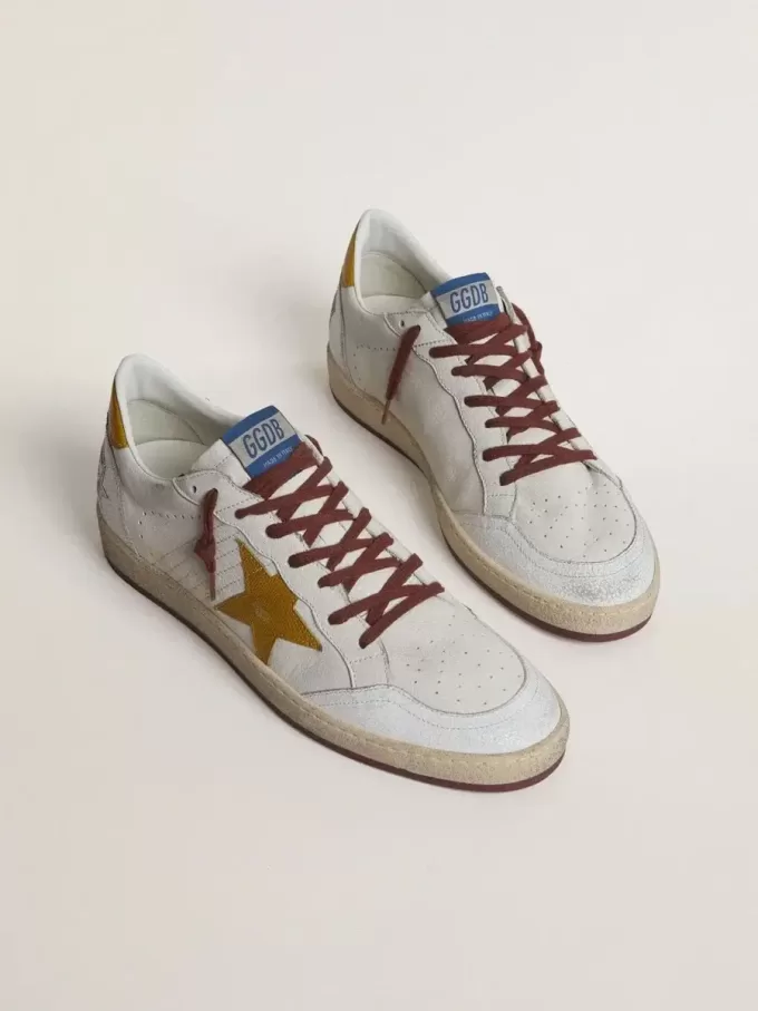 Ball Star da uomo in pelle nappa bianca con stella e linguetta sul tallone in pelle gialla con stampa animalier