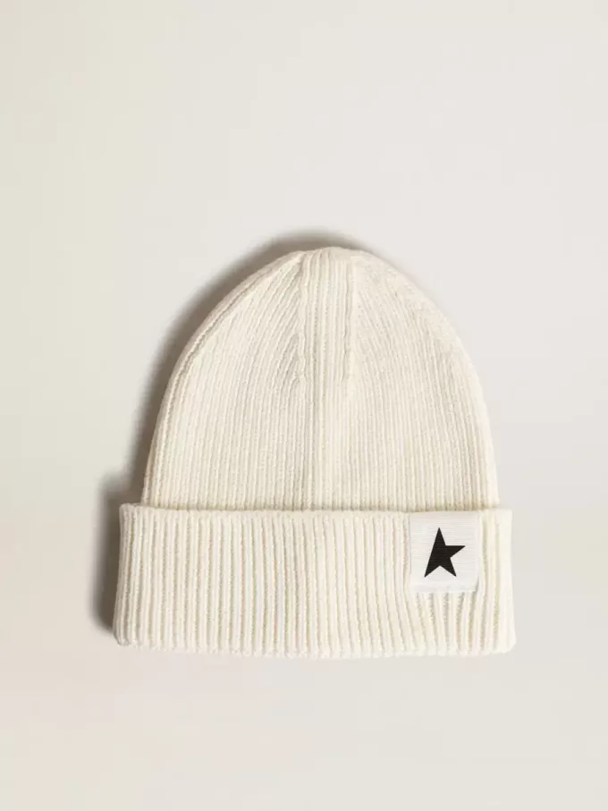 Berretto in cotone bianco sporco con stella nera a contrasto