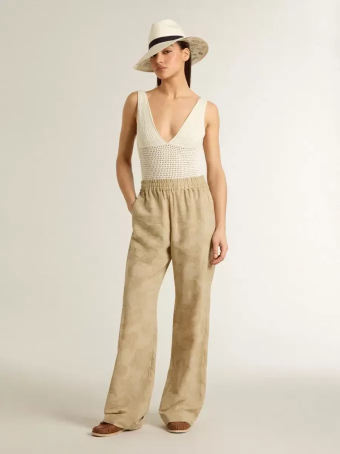 Body da donna in cotone bianco lavorato all’uncinetto