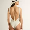 Body da donna in cotone bianco lavorato all’uncinetto