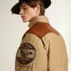 Bomber beige con dettagli in pelle e patch