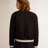 Bomber da donna in lana blu scuro con dettagli bianchi Bomber da donna in lana blu scuro con dettagli bianchi