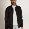 Bomber da uomo in lana blu scuro con maniche in pelle Bomber da uomo in lana blu scuro con maniche in pelle