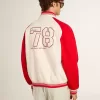 Bomber in cotone bianco e rosso consumato con ricami