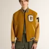 Bomber in lana giallo ocra con maniche in pelle