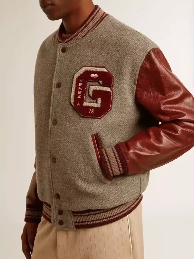 Bomber in lana grigio melange con maniche in pelle