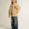 Bomber in pile beige per bambini Bomber in pile beige per bambini