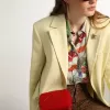 Borsa Mini Star da donna in pelle verniciata rossa con stella tono su tono Borsa Mini Star da donna in pelle verniciata rossa con stella tono su tono