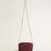Borsa Mini Star in pelle color vino con stella tono su tono Borsa Mini Star in pelle color vino con stella tono su tono