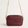 Borsa Mini Star in pelle color vino con stella tono su tono Borsa Mini Star in pelle color vino con stella tono su tono