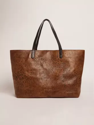 Borsa Pasadena in pelle martellata con stampa leopardata e manici neri a contrasto