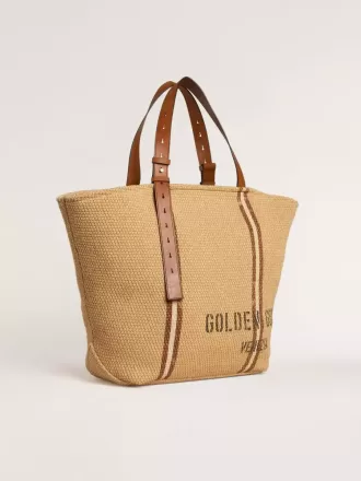 Borsa tote 24.7 in rafia naturale e pelle marrone con dettagli metallici dorati