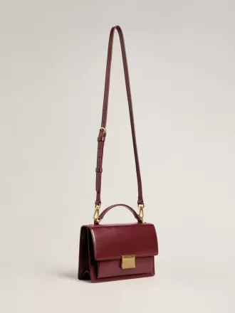 Borsa Venezia in pelle bordata bordeaux con dettagli dorati
