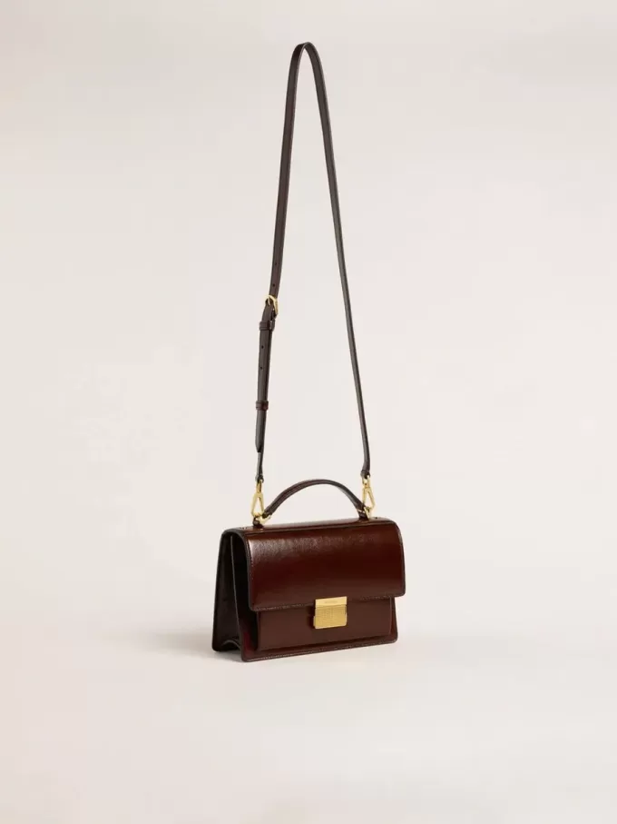 Borsa Venezia in pelle laminata marrone scuro con dettagli dorati Borsa Venezia in pelle laminata marrone scuro con dettagli dorati