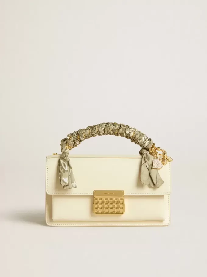 Borsa Venezia piccola in pelle color burro con sciarpa intrecciata e doppio ciondolo Borsa Venezia piccola in pelle color burro con sciarpa intrecciata e doppio ciondolo