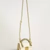 Borsa Venezia piccola in pelle color burro con sciarpa intrecciata e doppio ciondolo Borsa Venezia piccola in pelle color burro con sciarpa intrecciata e doppio ciondolo