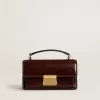 Borsa Venezia piccola in pelle laminata marrone scuro con dettagli dorati
