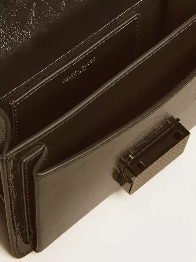 Borsa Venezia piccola in pelle metallizzata nera con dettagli neri Borsa Venezia piccola in pelle metallizzata nera con dettagli neri