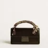 Borsa Venezia piccola in pelle metallizzata nera con dettagli neri Borsa Venezia piccola in pelle metallizzata nera con dettagli neri