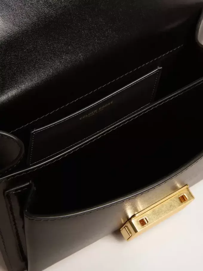 Borsa Venezia piccola in pelle nera bordata con foulard in seta