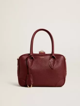 Borsa Vita in pelle bordeaux con dettagli dorati Borsa Vita in pelle bordeaux con dettagli dorati