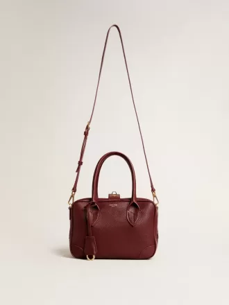 Borsa Vita in pelle bordeaux con dettagli dorati Borsa Vita in pelle bordeaux con dettagli dorati