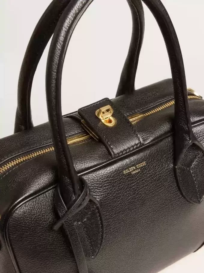 Borsa Vita in pelle di montone nera con dettagli dorati