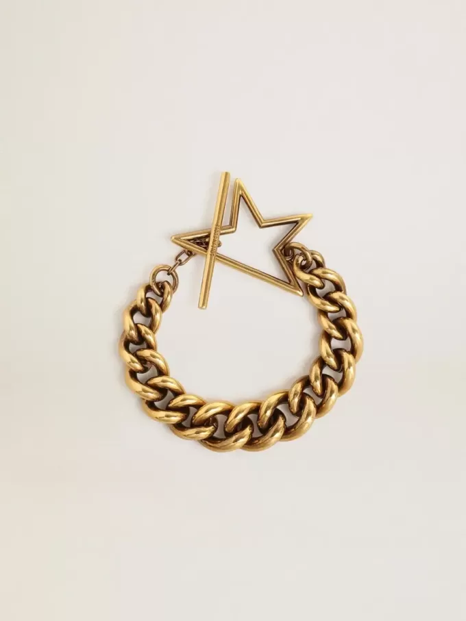 Bracciale con catena a maglie decrescenti in oro antico e chiusura a forma di stella