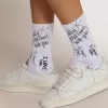 Calzini bianco ottico con scritte nere