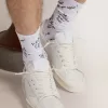 Calzini bianco ottico con scritte nere