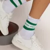 Calzini in cotone con finiture consumate, strisce verdi e logo Calzini in cotone con finiture consumate, strisce verdi e logo