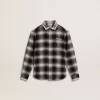 Camicia a quadri bianchi e neri con ricami bianchi per bambini
