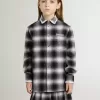 Camicia a quadri bianchi e neri con ricami bianchi per bambini
