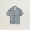Camicia blu da bambino con stampa bianca