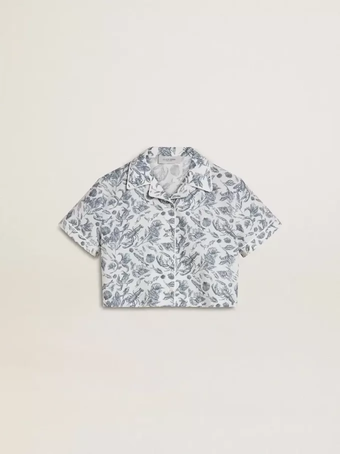 Camicia corta bianca da bambina con stampa blu Camicia corta bianca da bambina con stampa blu