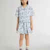 Camicia corta bianca da bambina con stampa blu Camicia corta bianca da bambina con stampa blu