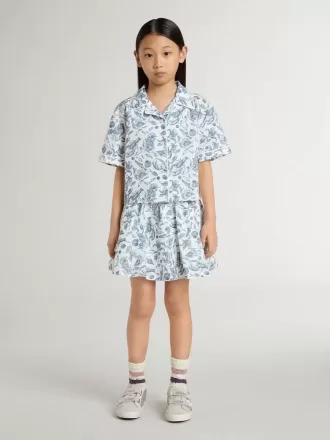 Camicia corta bianca da bambina con stampa blu