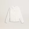 Camicia da bambina in cotone bianco con ricami inglesi Camicia da bambina in cotone bianco con ricami inglesi