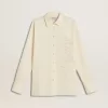 Camicia da donna in cotone color crema con ricami floreali Camicia da donna in cotone color crema con ricami floreali