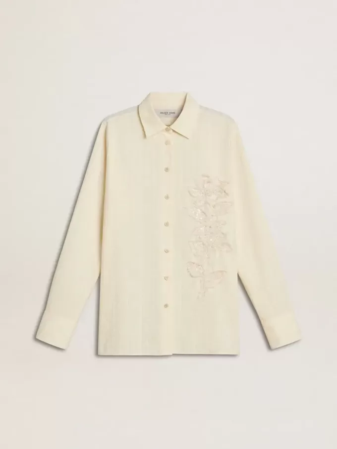 Camicia da donna in cotone color crema con ricami floreali Camicia da donna in cotone color crema con ricami floreali