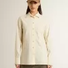 Camicia da donna in cotone color crema con ricami floreali Camicia da donna in cotone color crema con ricami floreali